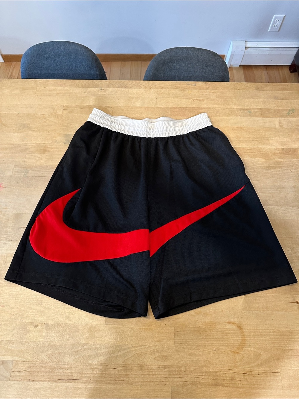 Nike Black Athletic Shorts with Red Swoosh